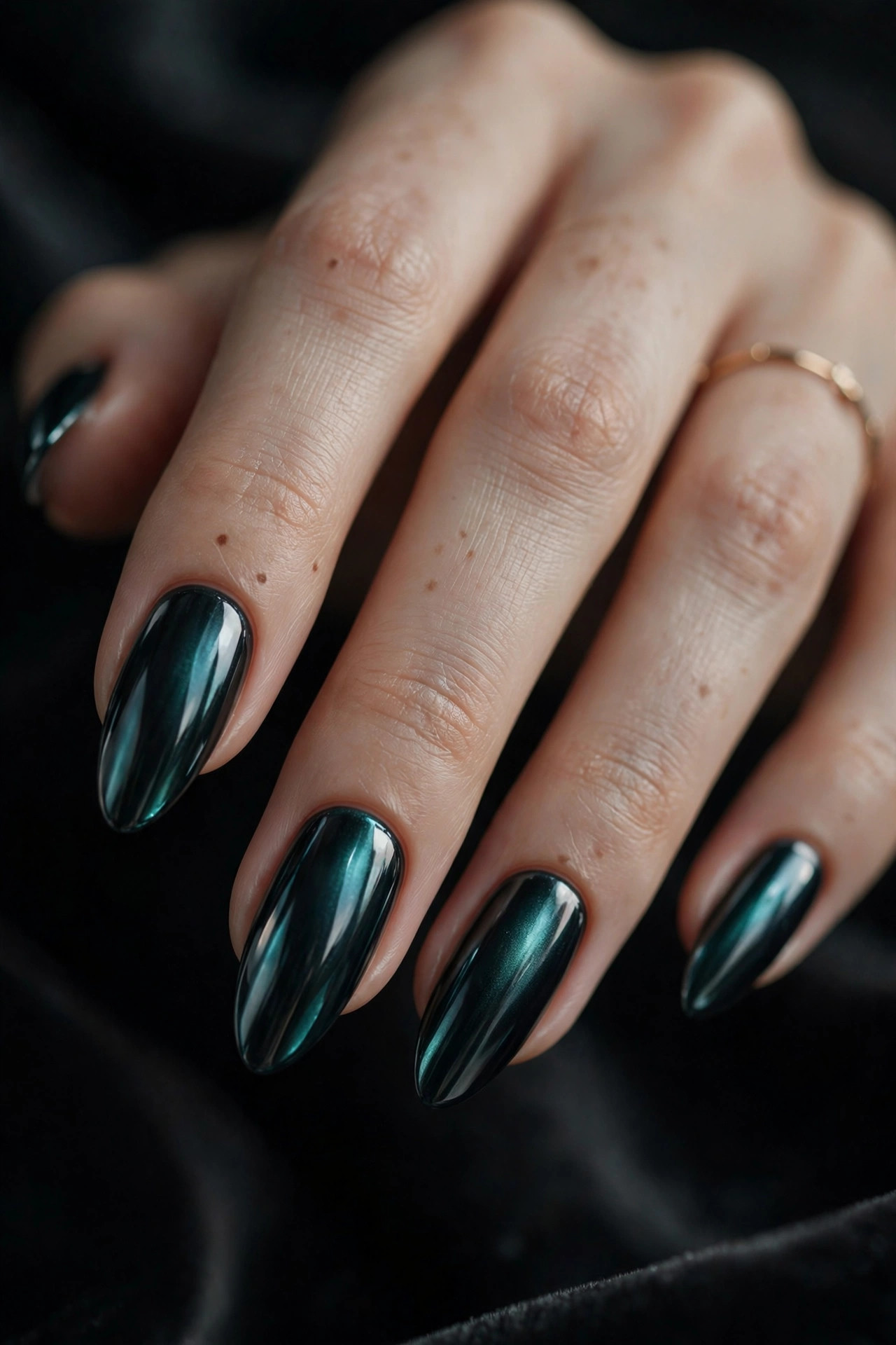 Blackened teal mirror chrome nails