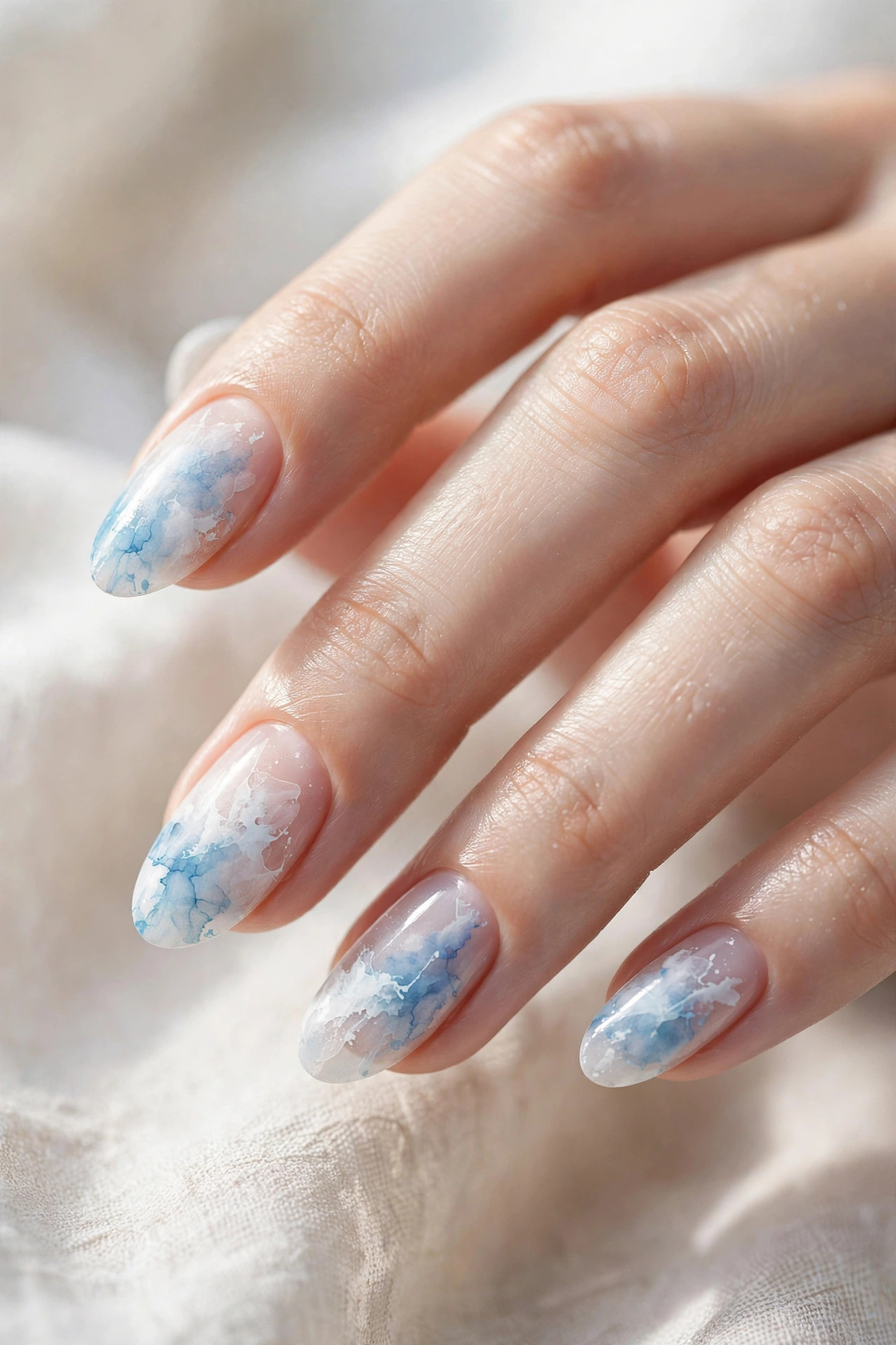Sky blue watercolor aura over sheer white