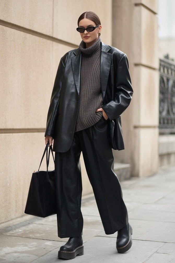 Leather bomber jacket with turtleneck and charcoal tailored trousers