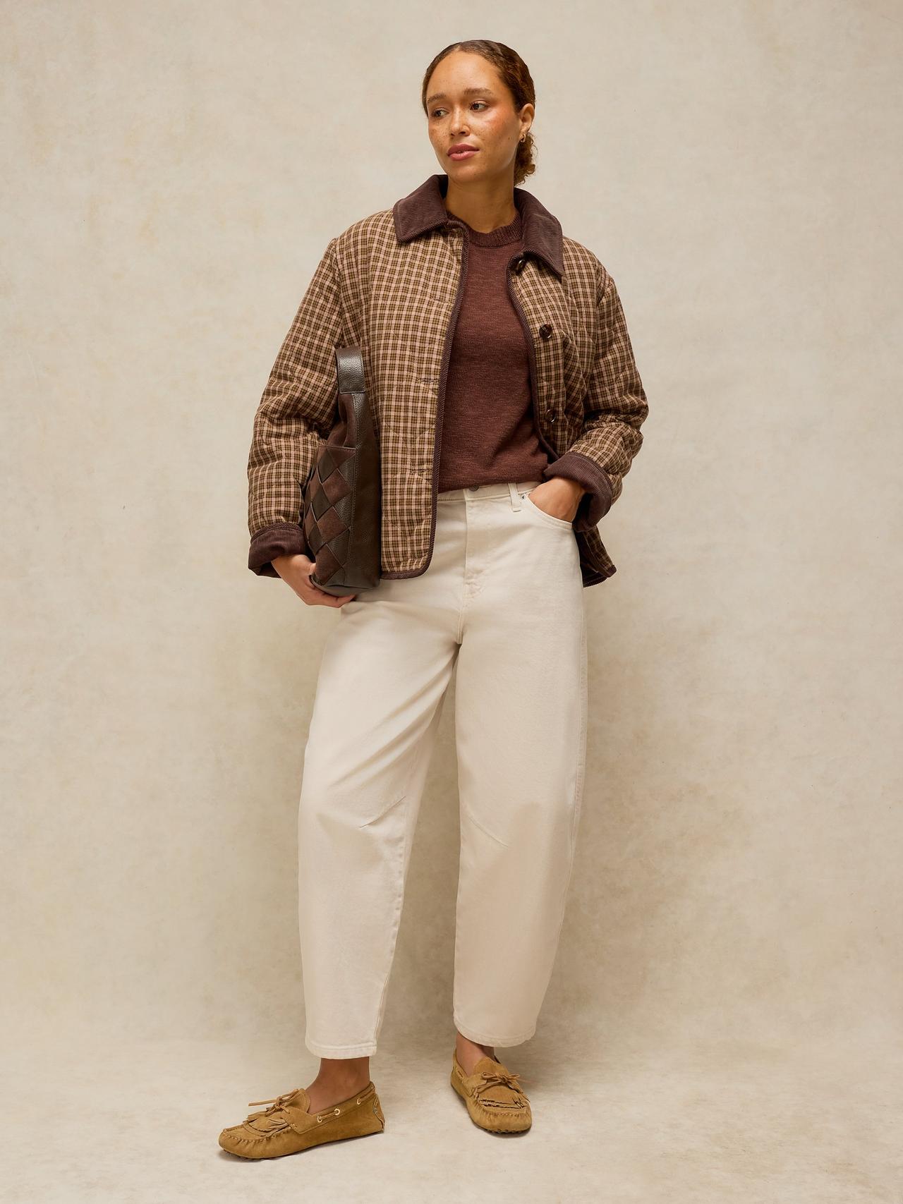 Quilted bomber jacket with cream knit and camel corduroy trousers, fall outfit