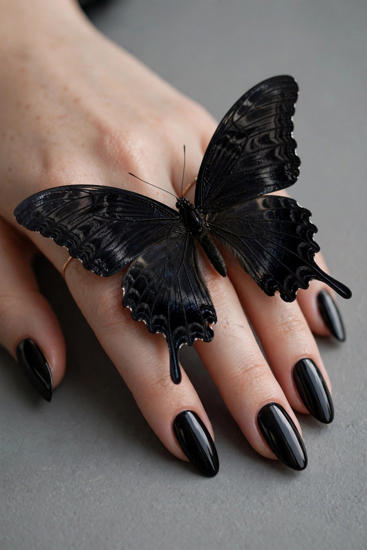 Matte gray nails with gothic black butterfly wings