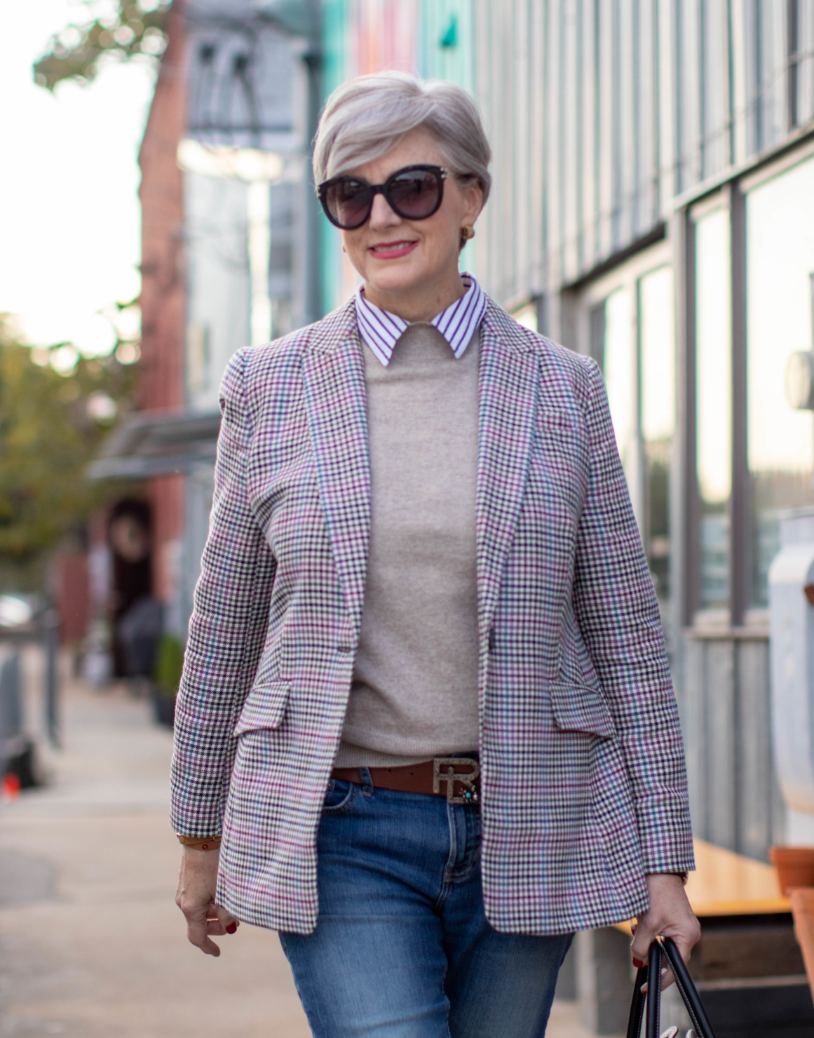 Woman over 50 in chambray shirt sweater and plaid blazer fall outfit