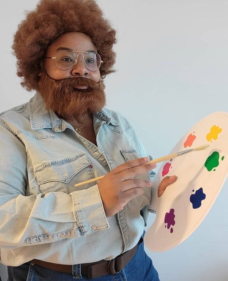 Bob Ross halloween costume with curly wig and painters palette