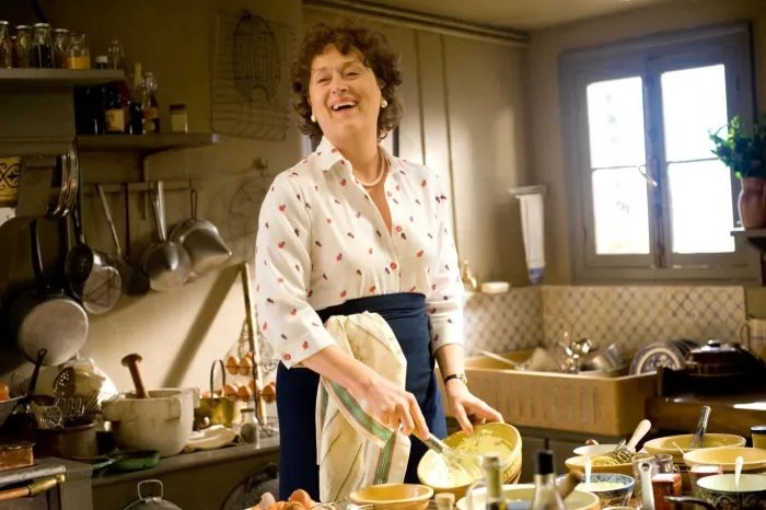 Julia Child halloween costume with pearls apron and whisk