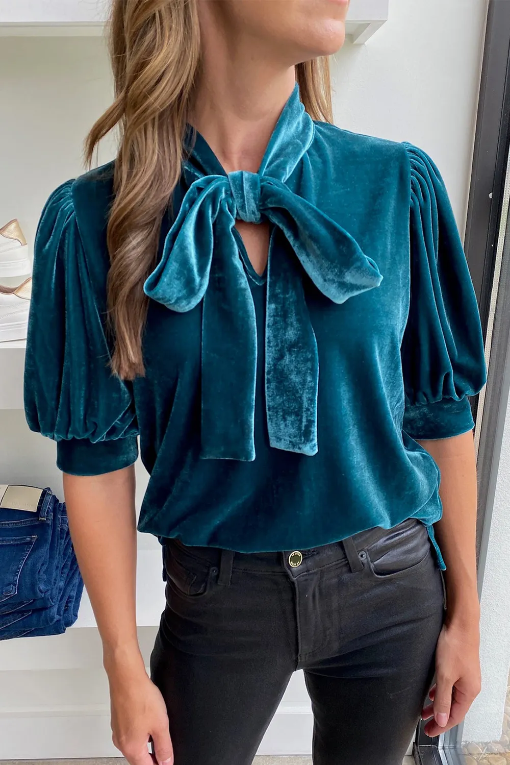 Satin hair bow with burgundy velvet top and jeans, romantic fall outfit over 50