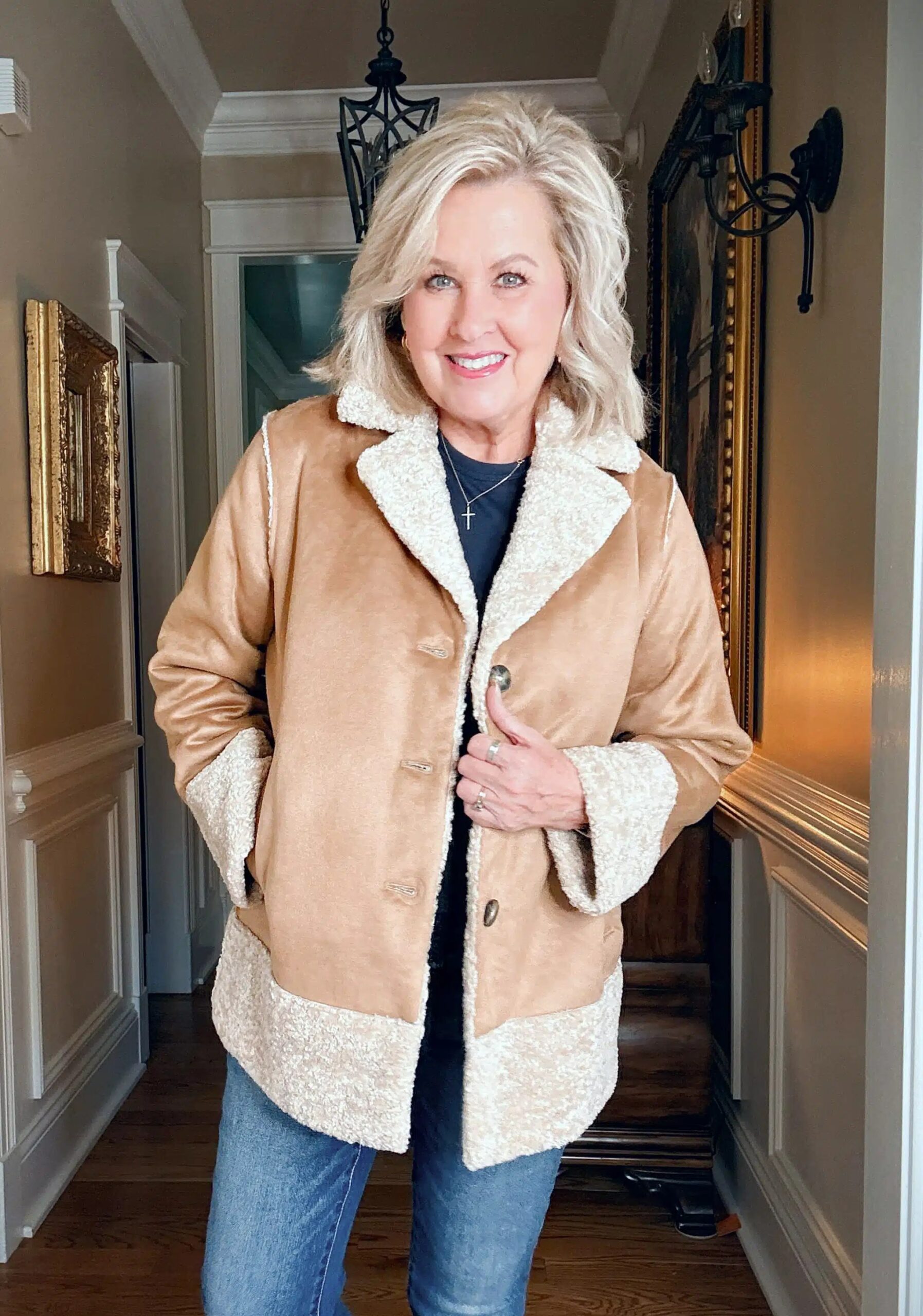 Tan suede shacket with cream knit and barrel jeans fall outfit