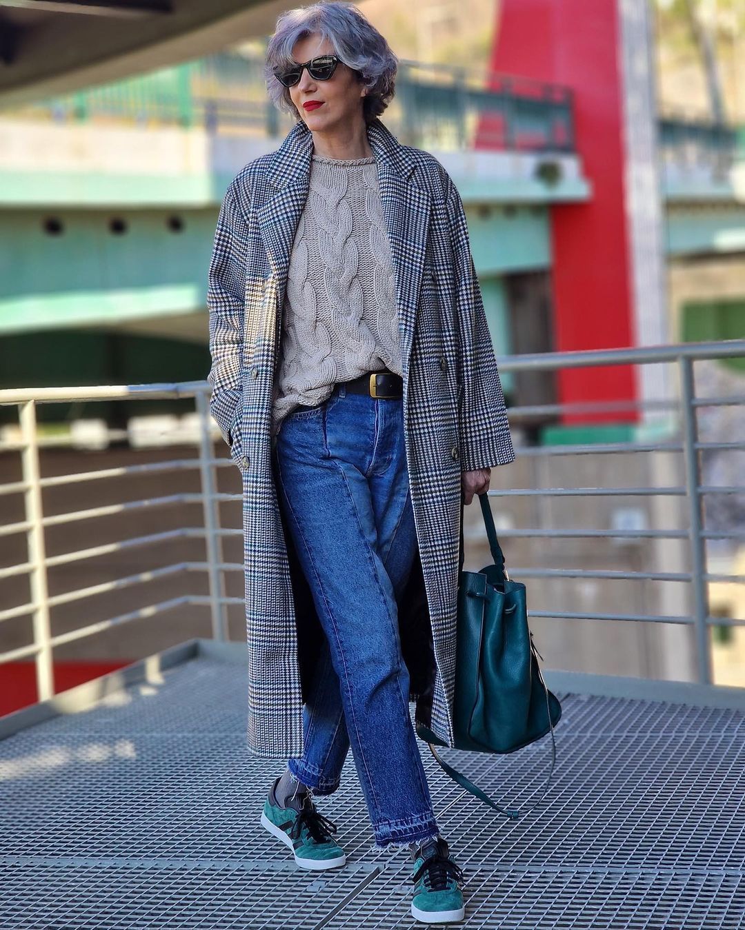 Tweed coat layered over hoodie and jeans street style for women over 50