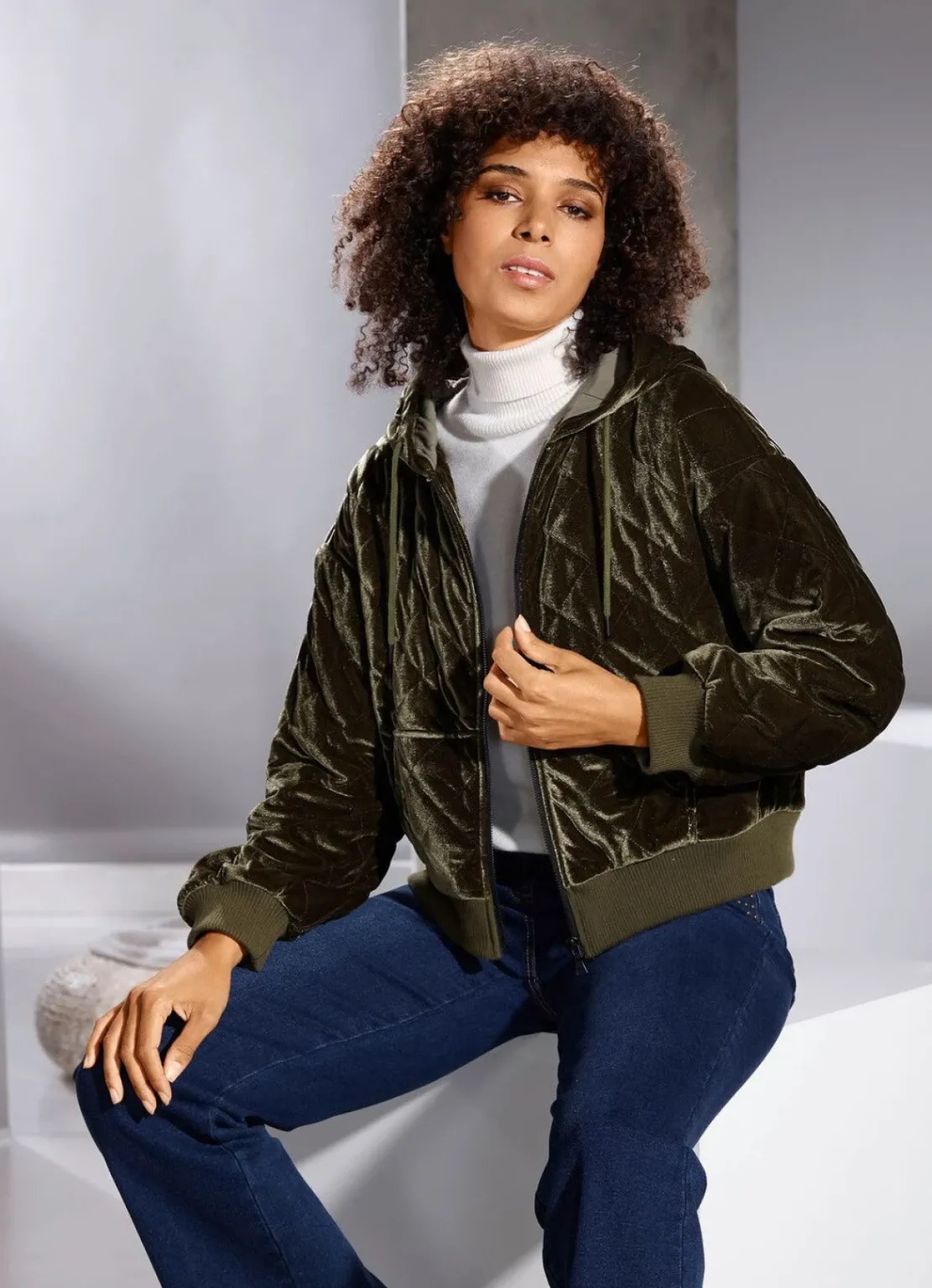 Velvet bomber jacket with turtleneck and jeans, casual fall outfit for women over 50
