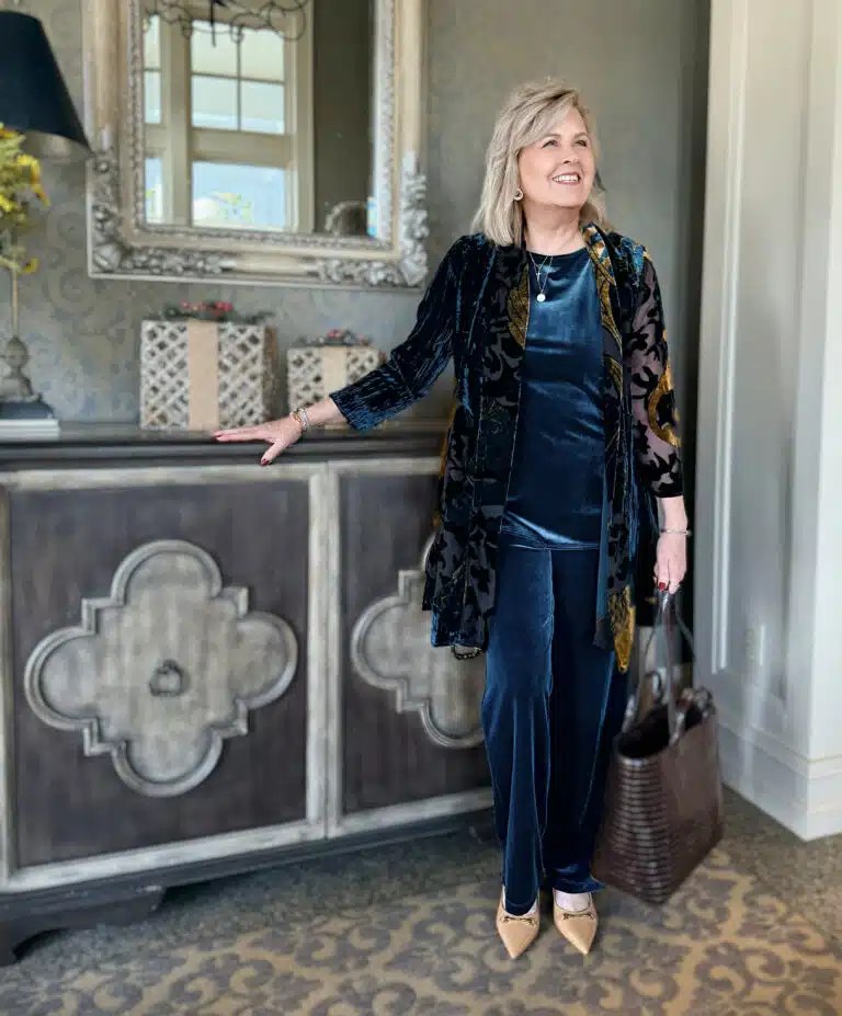 Sapphire blue velvet top with dark jeans and ankle boots, fall outfit for women over 50