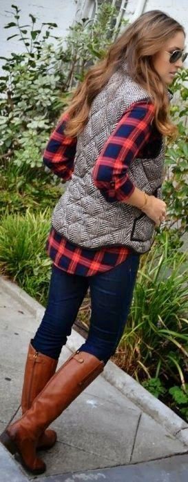 Woman over 50 in navy quilted jacket, red plaid shirt, corduroys and brown boots