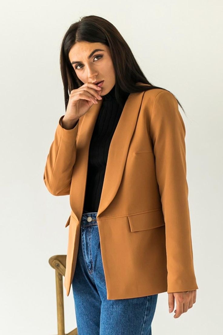 Black turtleneck with camel blazer and slim jeans — polished fall outfit for women over 50