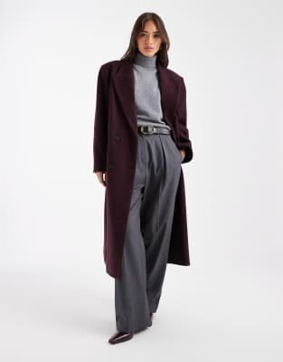 Grey wool coat with burgundy sweater, grey trousers and loafers — fall outfit for women over 50