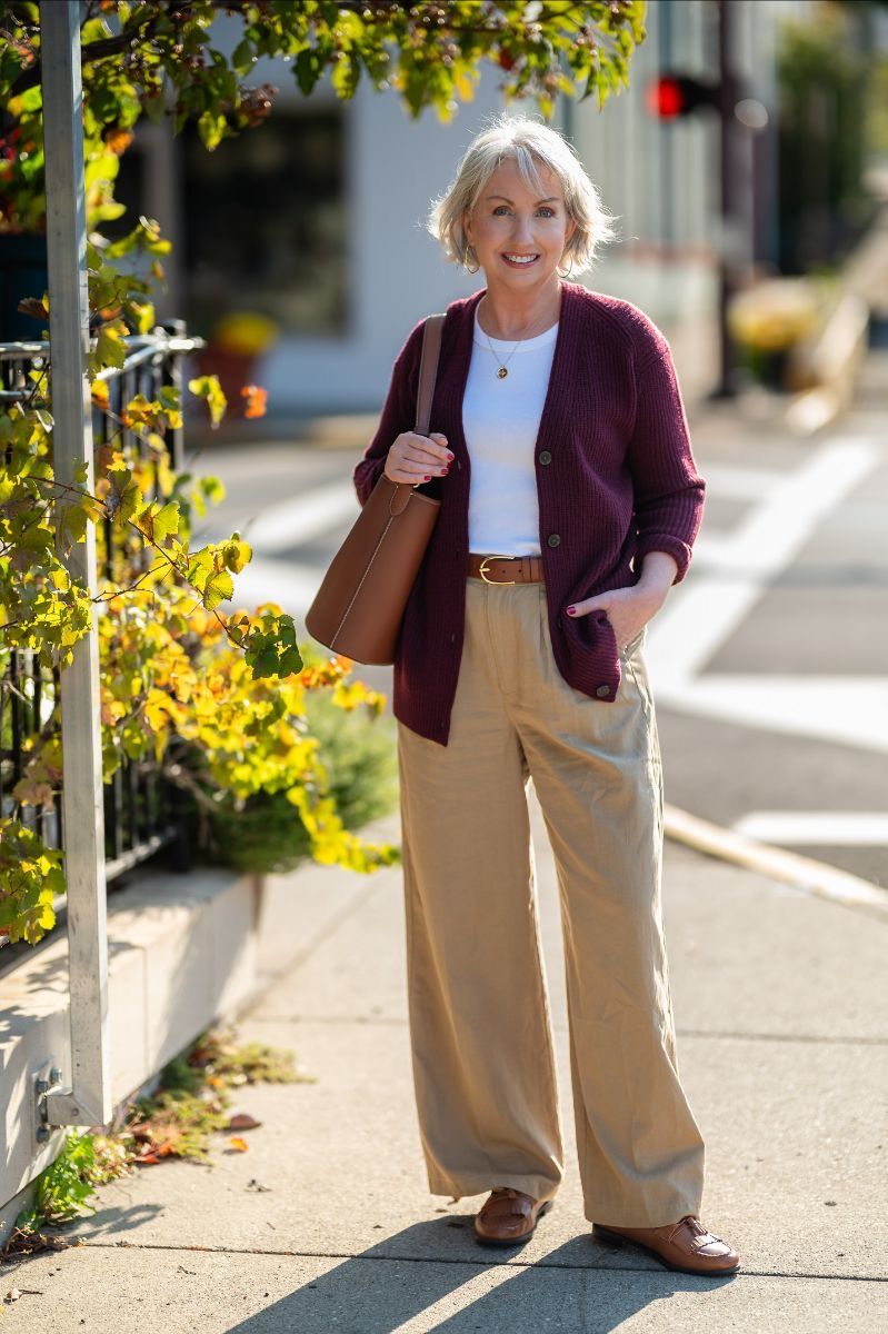 Olive midi skirt with soft lavender cardigan and brown loafers, feminine fall outfit