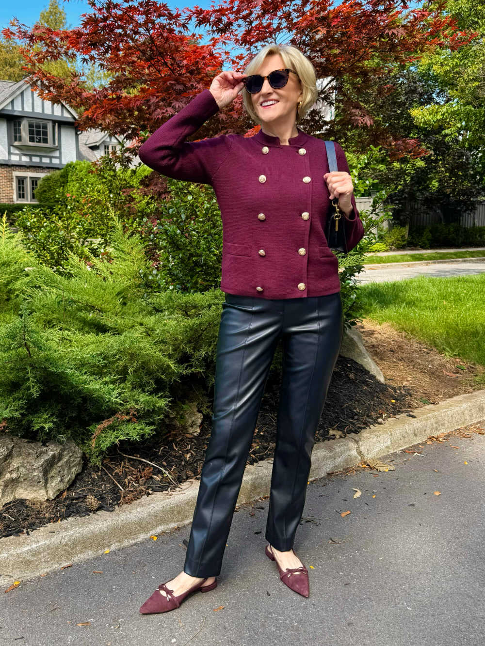 Olive utility jacket over burgundy sweater with black jeans, casual fall outfit