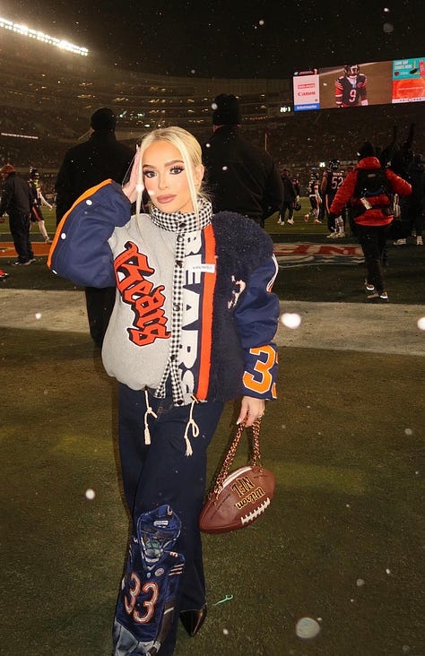 Night Game: Navy Parka + Blue Fleece + Orange Beanie - outfit idea for women over 50