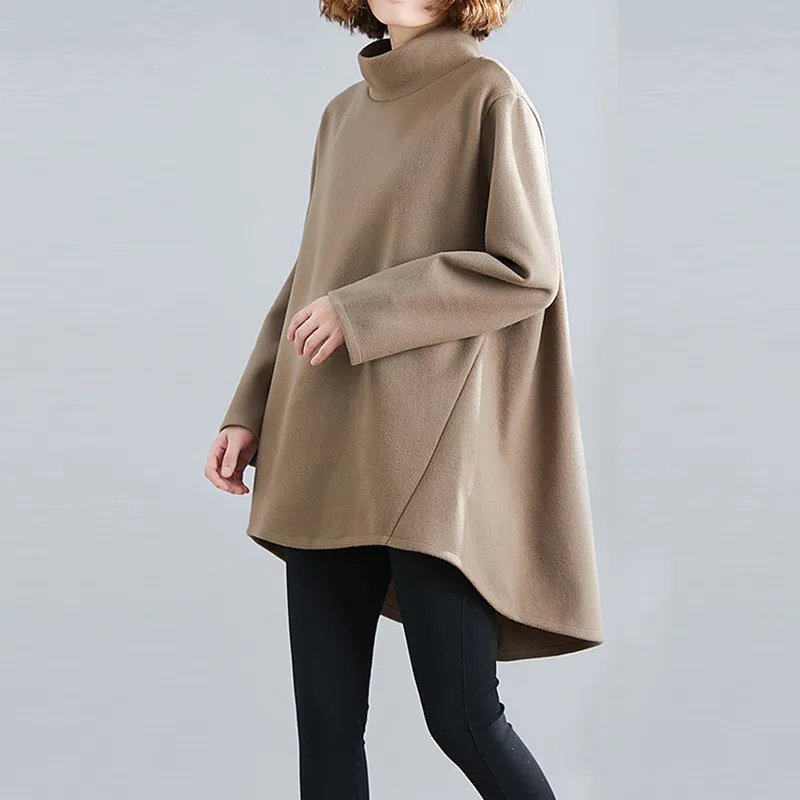 Oversized Black Sweater + Black Leggings → Black Sweater + Camel Coat - outfit idea for women over 50