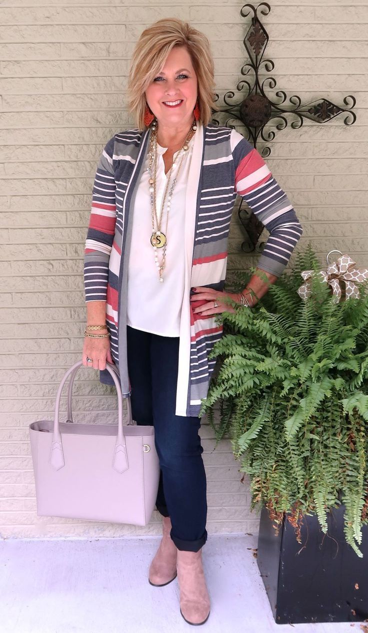 Chunky knit cardigan over striped tee with dark jeans, fall outfit for women over 50