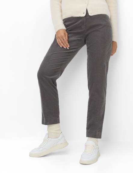 Navy sweater with cream corduroys and sneakers, casual pumpkin patch outfit over 50