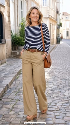 Rust suede loafers with navy trousers and striped tee outfit