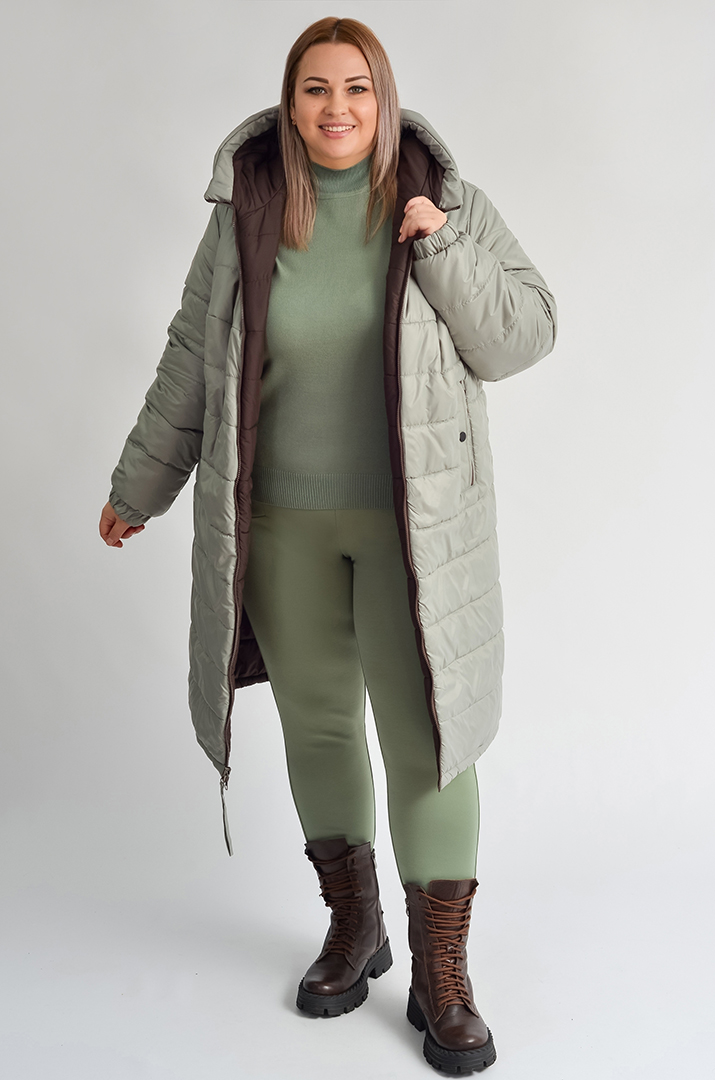Olive quilted shacket with a turtleneck, leggings and knee boots, woman over 50