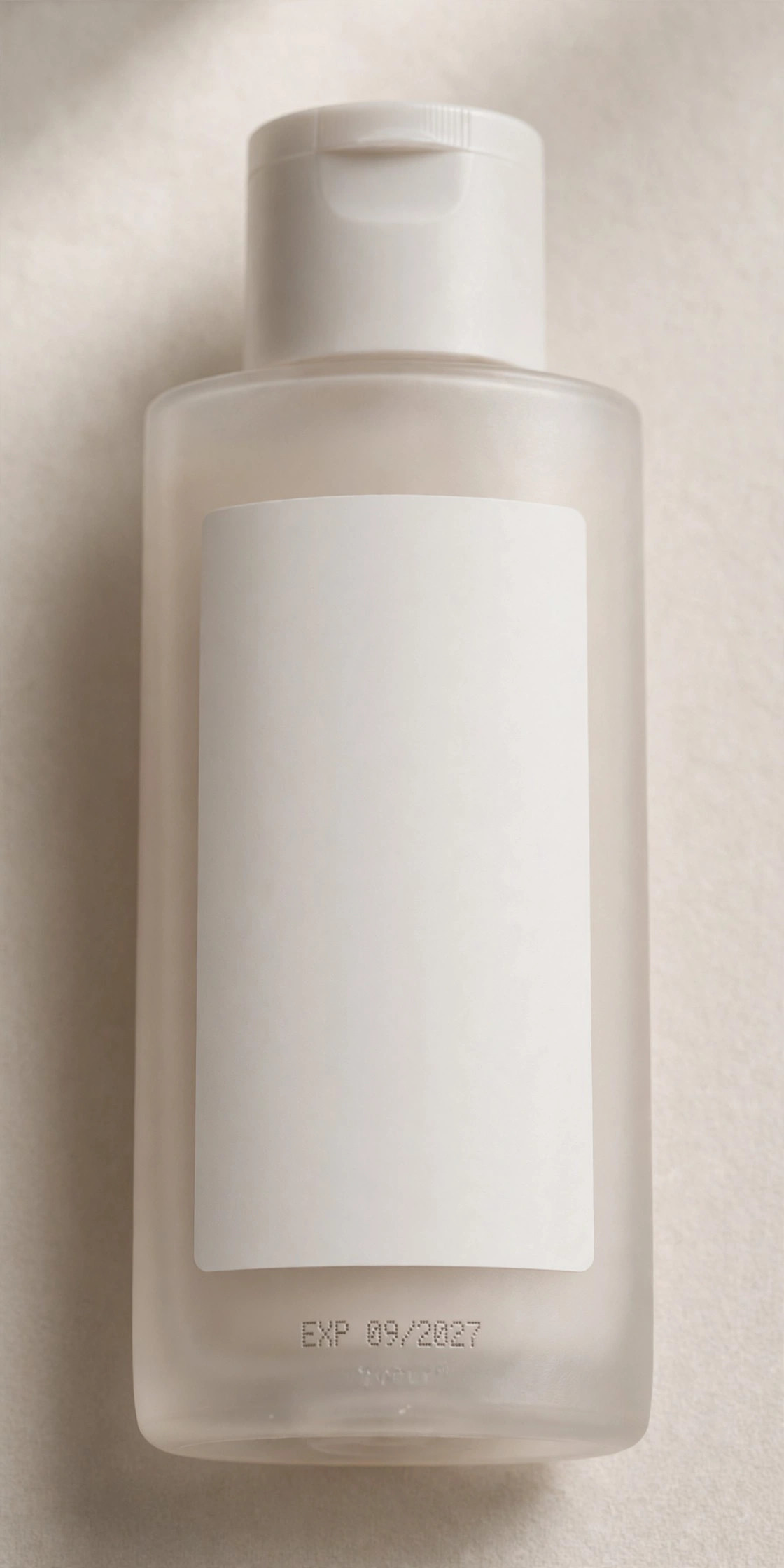 Sunscreen bottle showing expiry date on the packaging